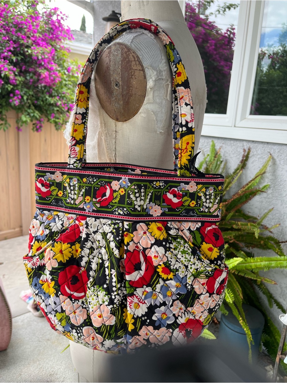 Vera Bradley bucket bag with front pockets and pleat